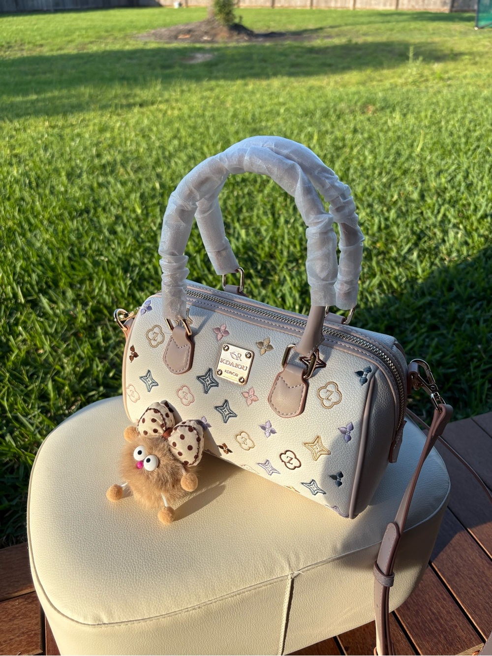 Ivory Patterned Dome Satchel Handbag with Plush Charm
